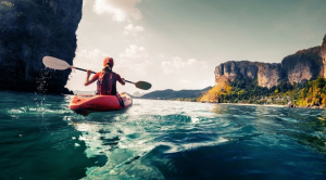 Woman kayaking on the ocean 